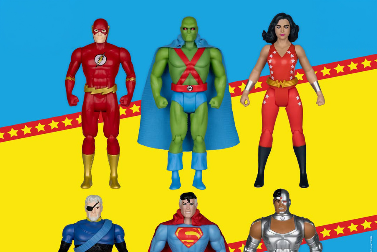 Full reveal graphic showing six McFarlane Toys DC Super Powers retro 4.5-inch figures: Silver Age Flash, Martian Manhunter, Wonder Girl, Deathstroke, JSA Superman, and Metallic Cyborg set against a blue and yellow star background.